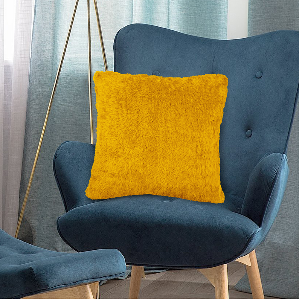 yellow fuzzy throw pillow