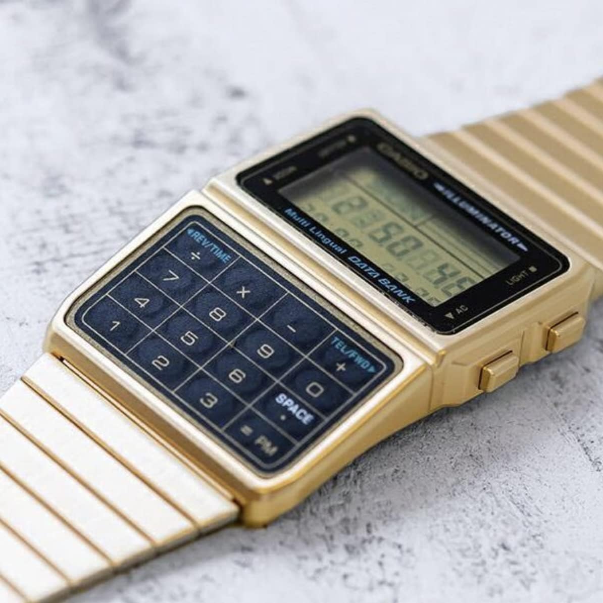 Casio #DBC611G-1D Men's Gold Tone 25 Memory Calculator
